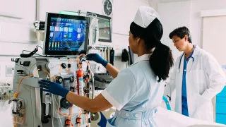 Female nurse conducting blood purification therapy
