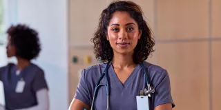 Healthcare professional with crossed arms