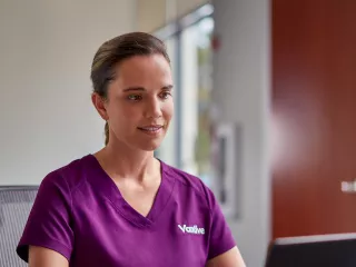 Vantive healthcare professional works at her desk